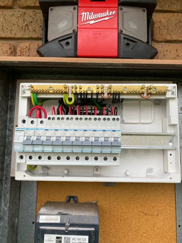 New Hager switchboard with RCBOs on comb busbars and the cover off during installation