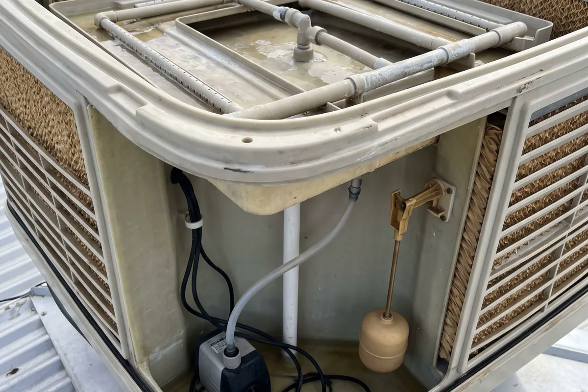 Evaporative cooler internals during a repair